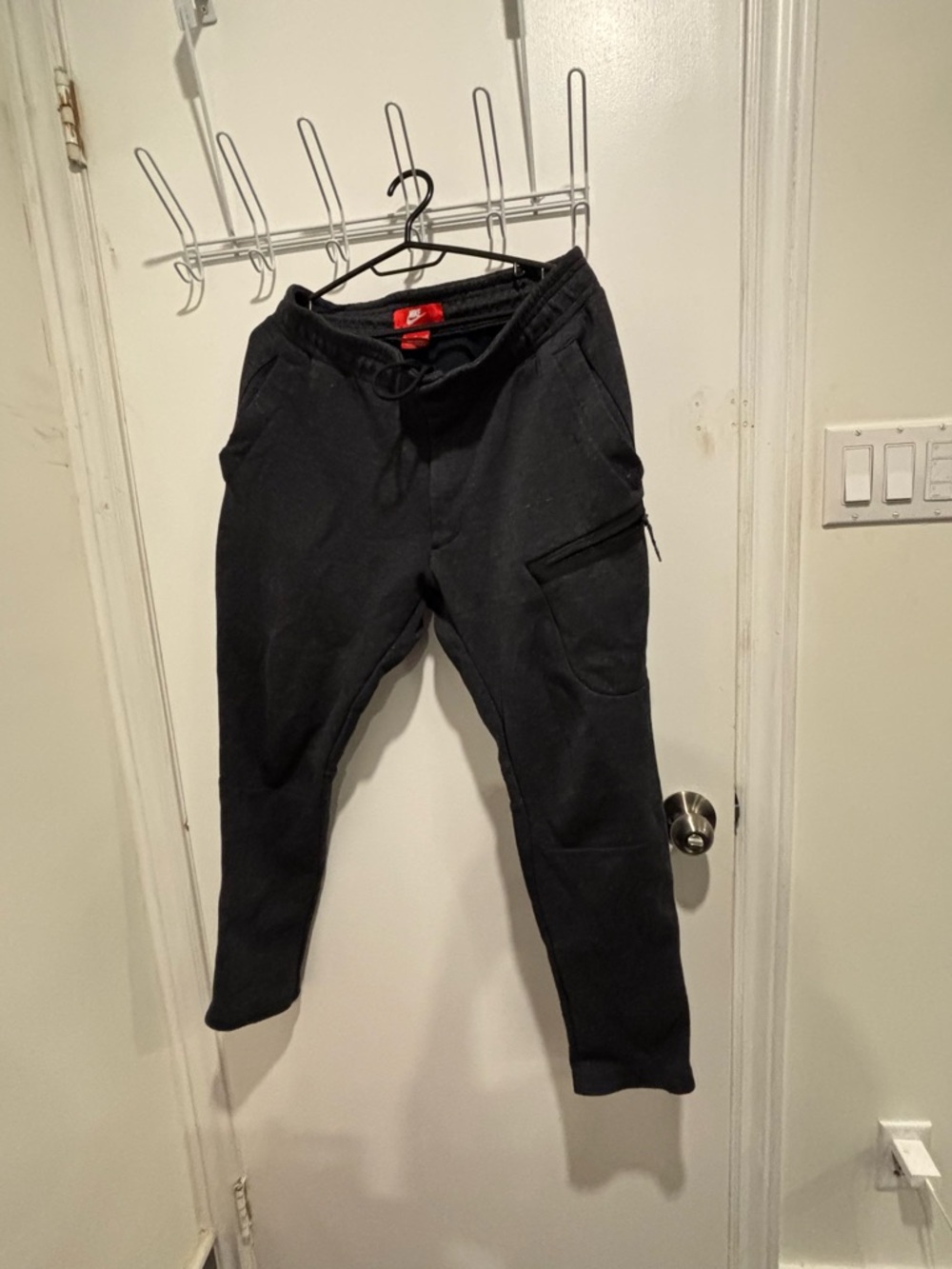 Nike Black Men's Zip Pocket Joggers zipper at the front 1 pocket had problem,